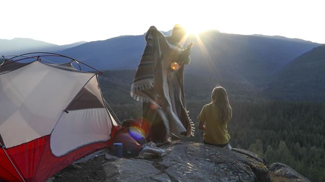Couple camping on a mountain